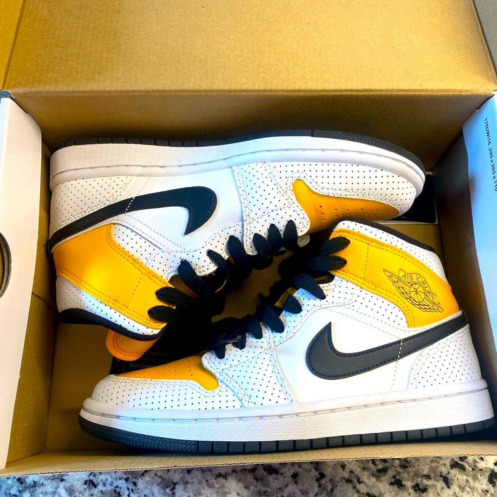 Woman’s Air Jordan 1 Mid Perforated